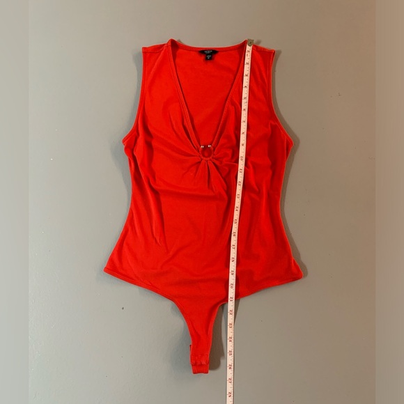 Orange bodysuit with silver ring - Picture 2 of 5